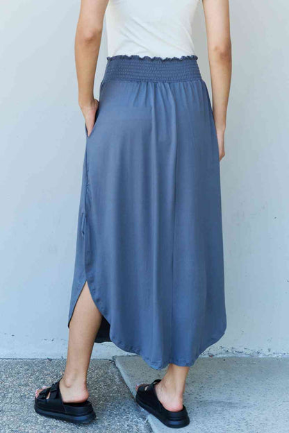 Britt High Waist Scoop Hem Maxi Skirt in Dusty Blue